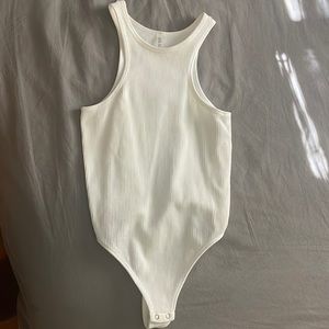 NEVER WORN BEFORE WHITE BODYSUIT